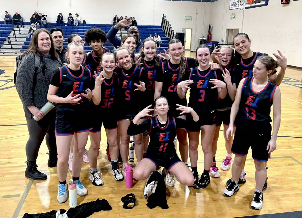 The East Jefferson girls basketball team celebrates their district playoff win over Cascade Christian on Saturday in a game that the Rivals trailed by nine points in the fourth quarter. The win also assures the Rivals a winning season. (East Jefferson girls basketball)