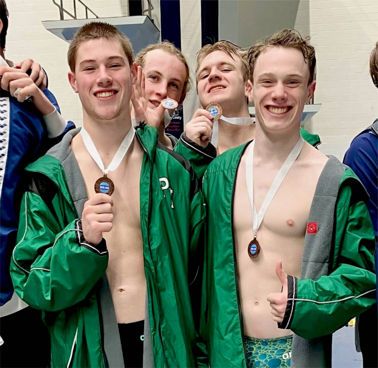 The Port Angeles 400 freestyle relay team finished sixth at the state swim meet in Federal Way this weekend, the top relay finish for the riders. From left are Finn Thompson, Miles Van Denburg, Thomas Jones and Patrick Ross. (Sally Cole)