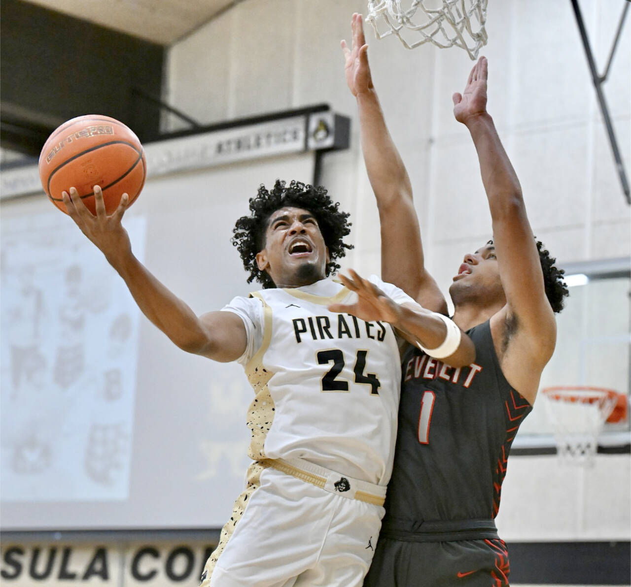 Peninsula College's Jaiden Blackmon goes up for a layup against Everett College in Port Angeles on Jan. 25.  Blackmon's the team's leading scorer at 15.5 points a game, is looking to help lead the Pirates into the playoffs with a win tonight over Shoreline. (Jay Cline/Peninsula College)