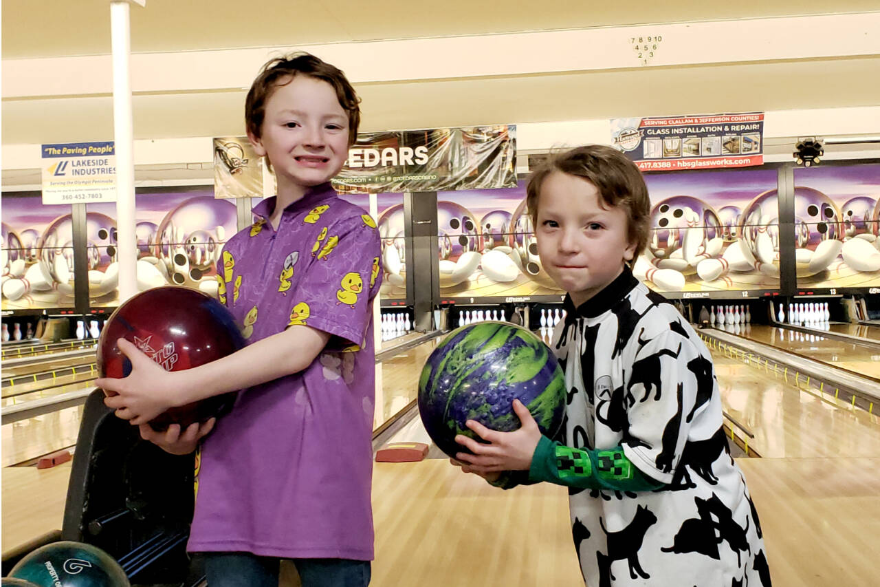 From left, Dennis and Dillon Tisdale of Port Angeles won first- and second-place medals at the  Washington State USBC West Pepsi Sectionals held in Mount Vernon this weekend. (Trish Tisdale)