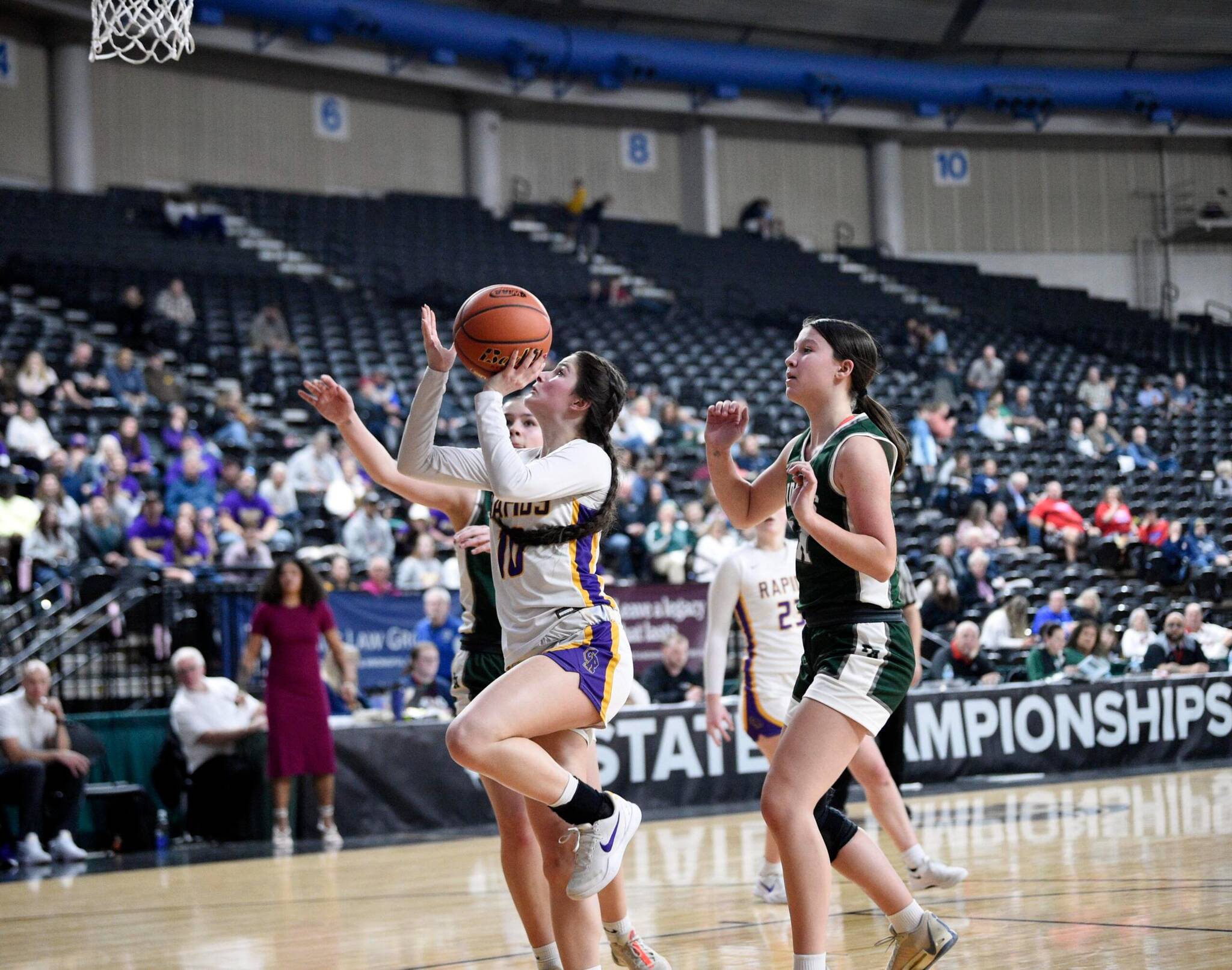 Columbia River's Camy Drake goes up for a shot against Port Angeles during a Class 2A girls basketball State Round of 12 game on Wednesday, March 5, 2025, at Yakima SunDome. (Will Denner/The Columbian)